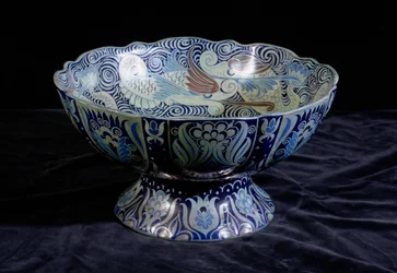 Punch Bowl with ship in the centre and a frieze of fish and waves round the rim